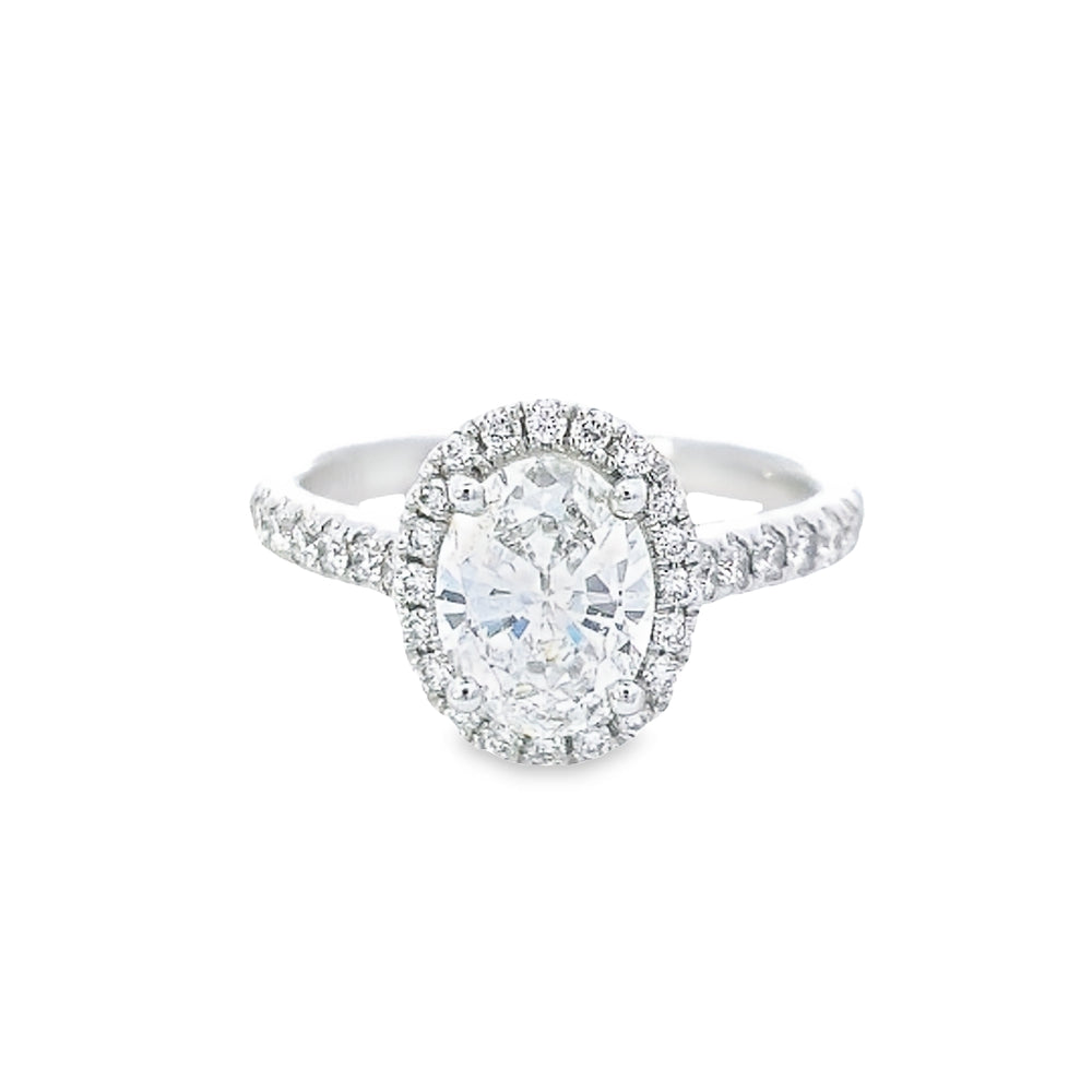 GIA 1.03ct F/VS1 Oval Cut Diamond Halo Ring set in Platinum