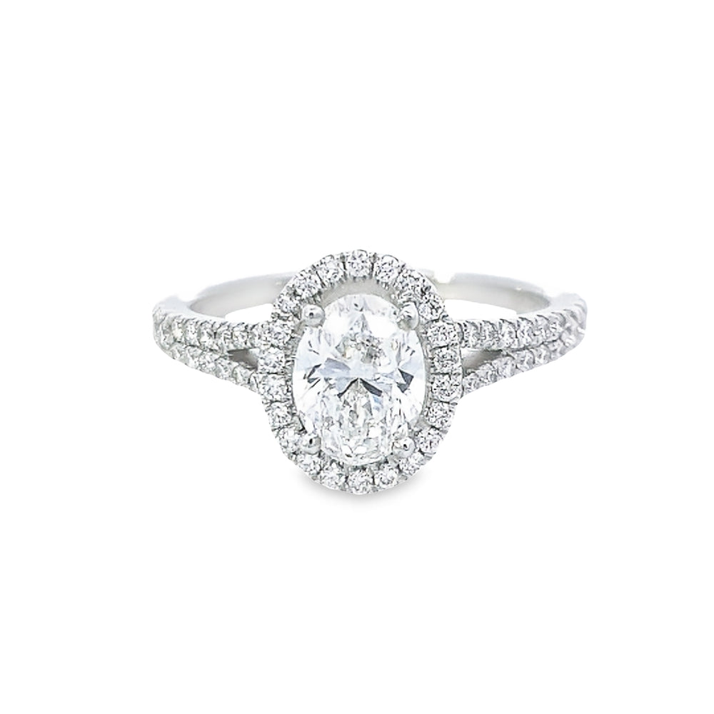 GIA 1.00ct E/VS2 Oval Cut Diamond Halo Ring set in Platinum