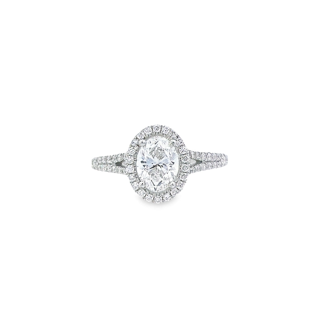 GIA 1.00ct E/VS2 Oval Cut Diamond Halo Ring set in Platinum