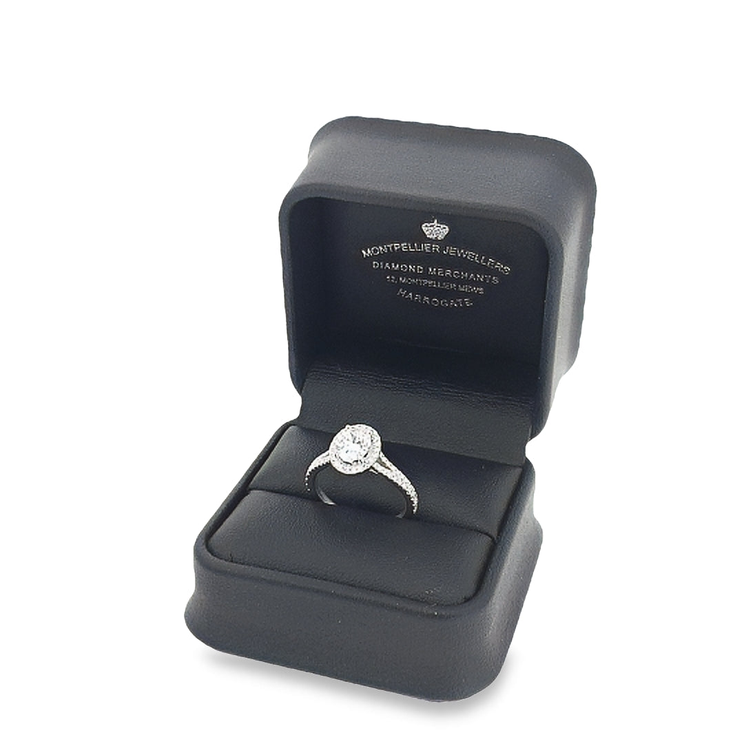 GIA 1.00ct E/VS2 Oval Cut Diamond Halo Ring set in Platinum