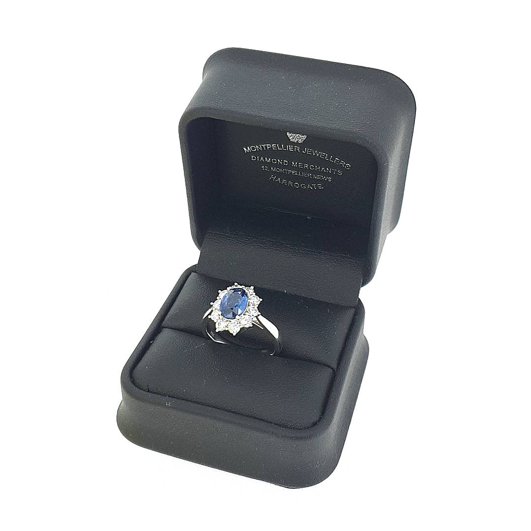 Oval Cut Sapphire & Diamond Cluster Ring Set in 18ct Gold