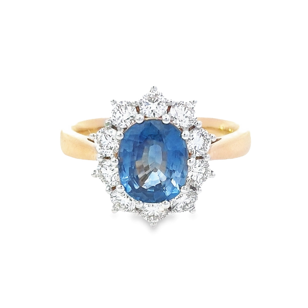 Oval Cut Sapphire & Diamond Cluster Ring Set in 18ct Gold