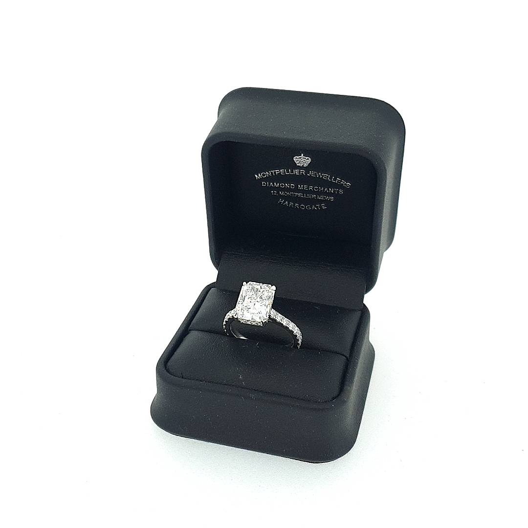 GIA 5.02ct H/SI1 Radiant Cut Diamond Solitaire set in Platinum with Diamond Band - Montpellier Jewellers