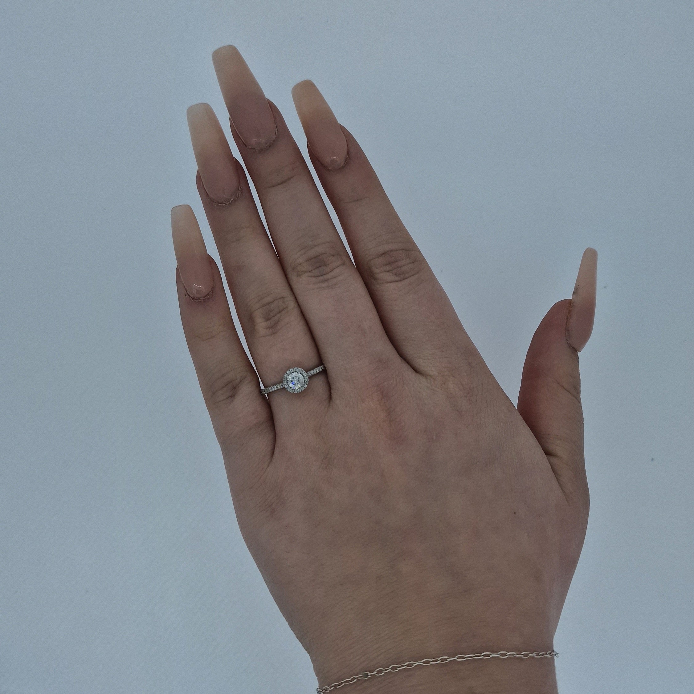 0.33ct G/SI2 Diamond Halo Ring set in Platinum