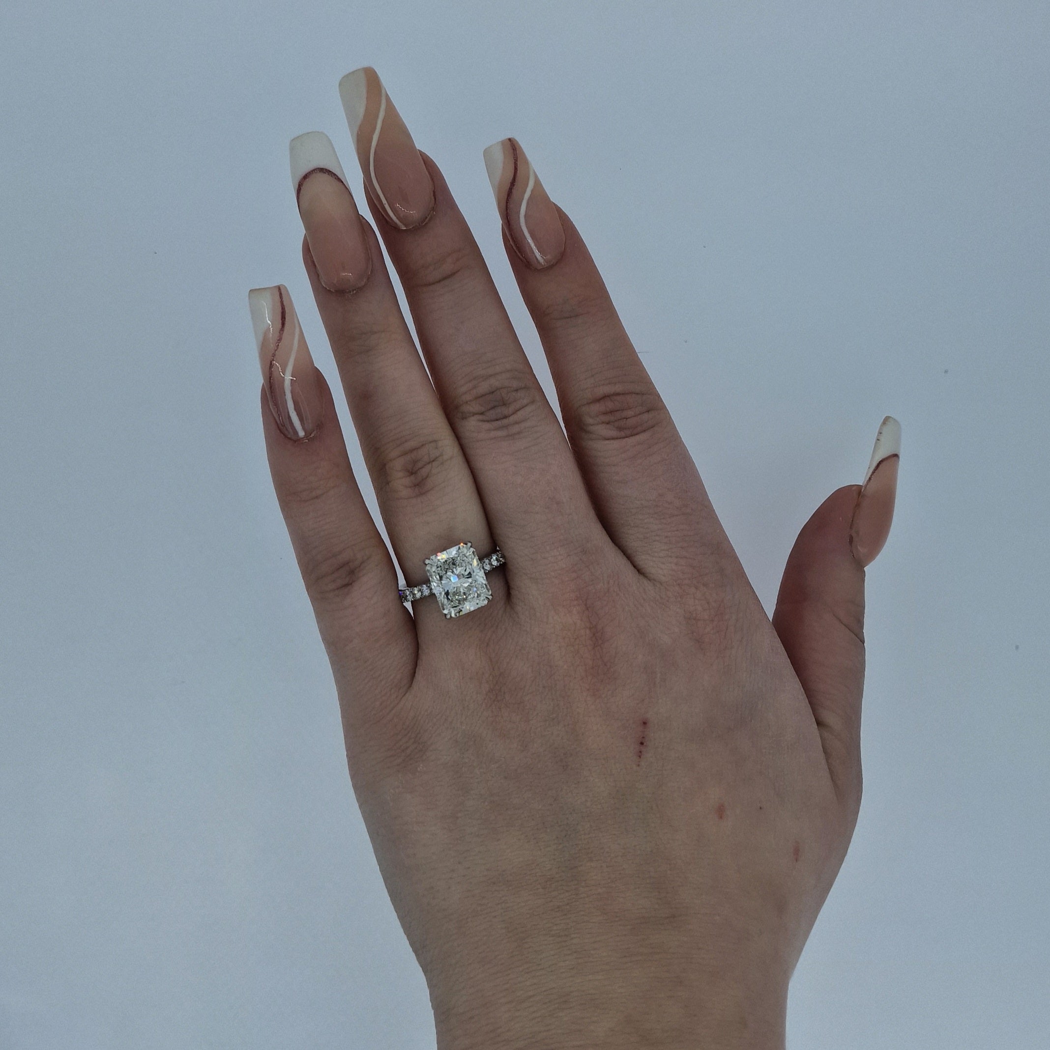 GIA 5.02ct H/SI1 Radiant Cut Diamond Solitaire set in Platinum with Diamond Band - Montpellier Jewellers