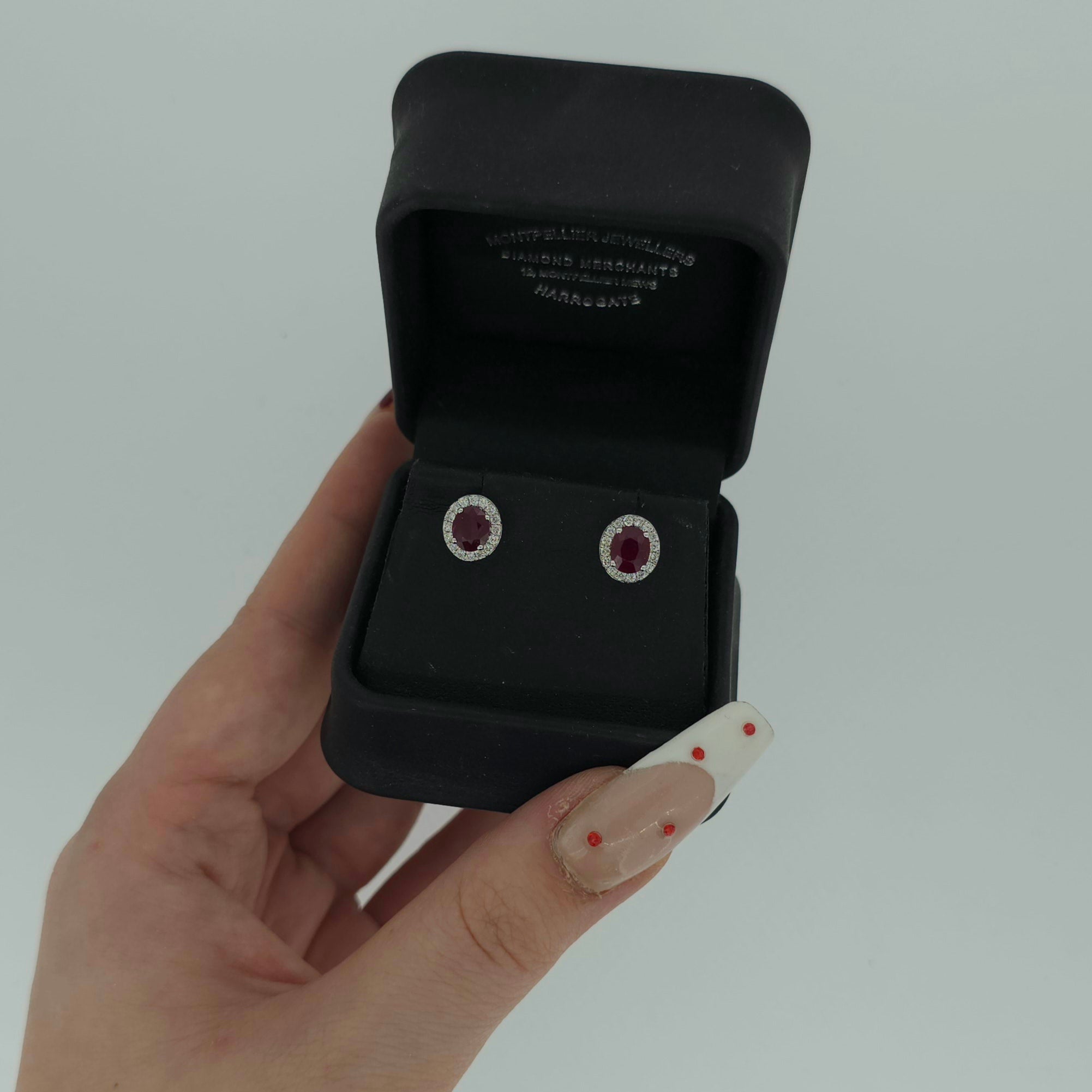 VIP Ruby & Diamond Halo Earrings Set In 18ct White Gold - Montpellier Jewellers