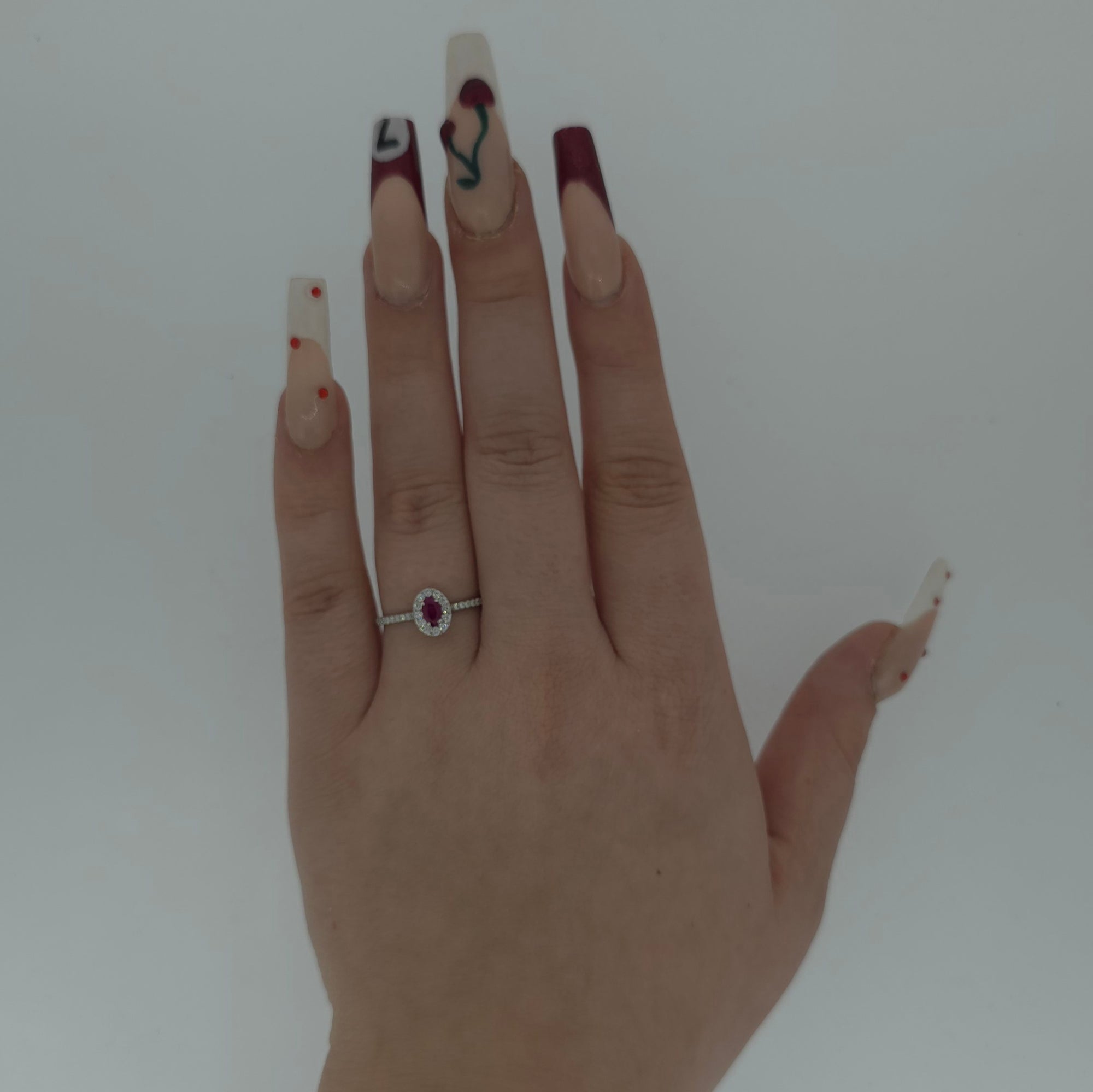 Oval Cut Ruby & Diamond Halo Ring Set in Platinum