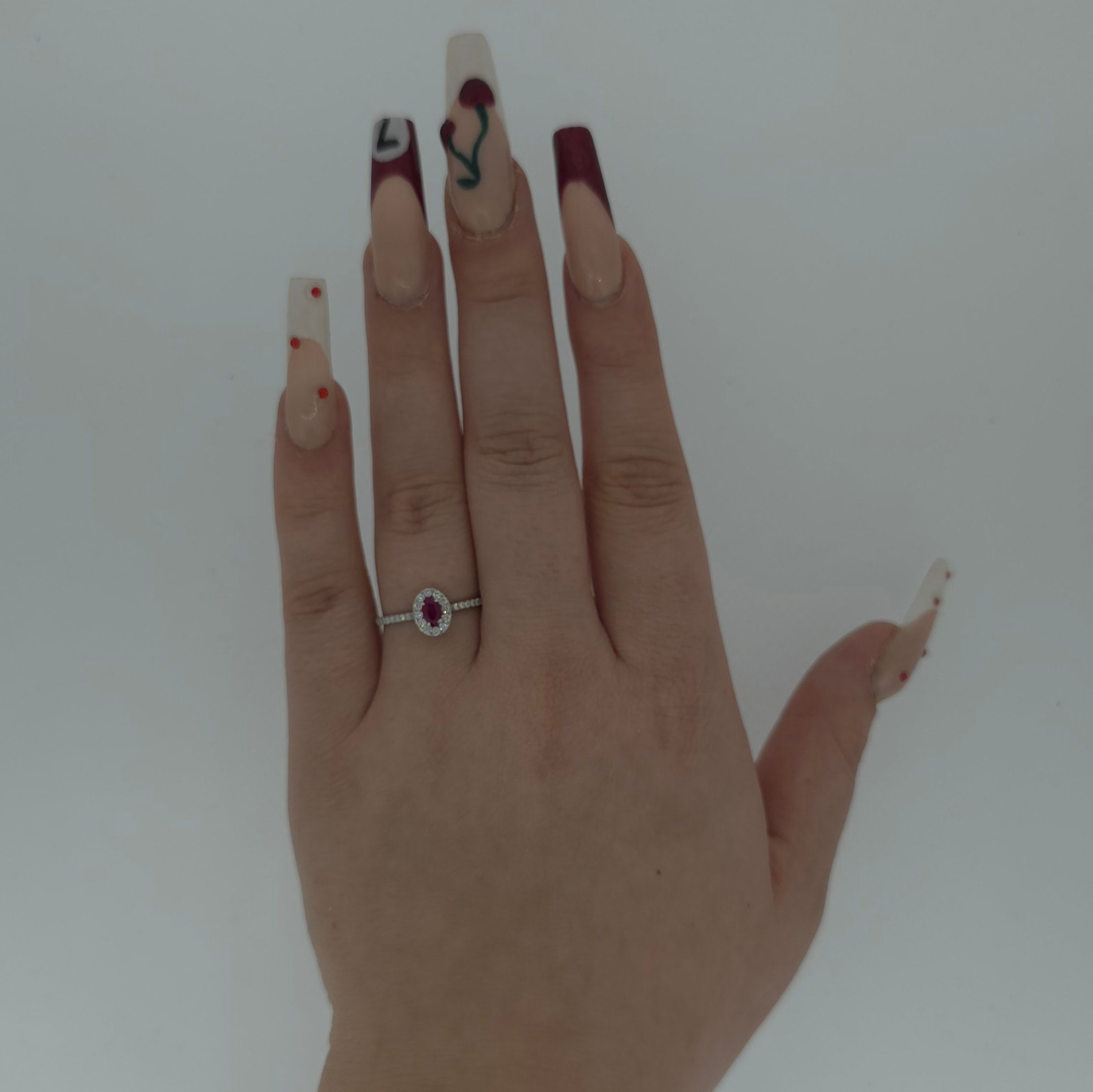 Oval Cut Ruby & Diamond Halo Ring Set in Platinum