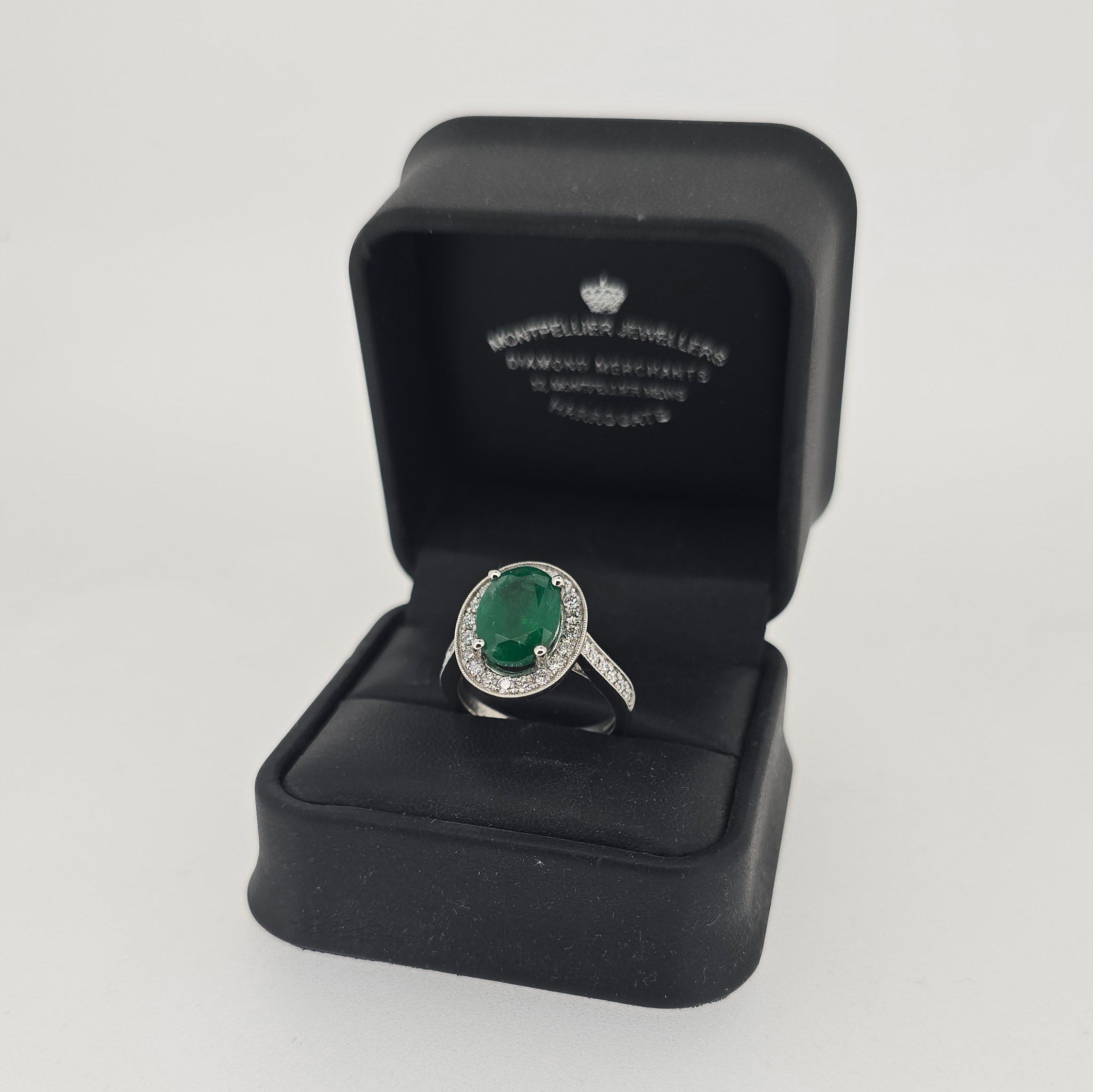 VIP 3.93ct Emerald and Diamond Halo Ring with Diamond Shoulders Set in Platinum - Montpellier Jewellers