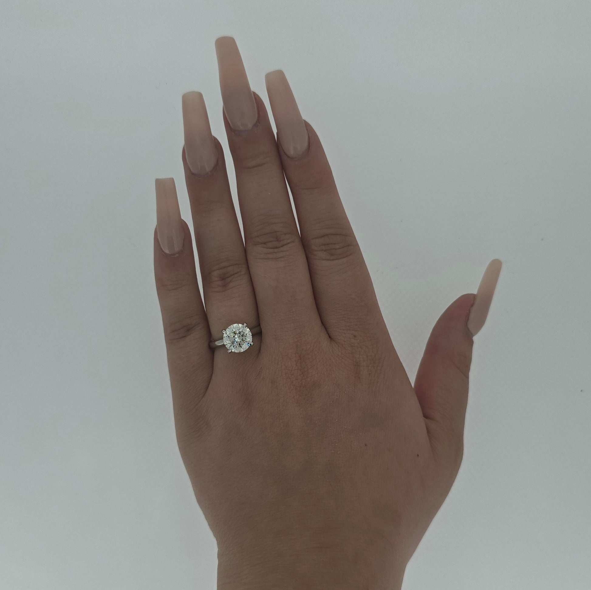 GIA 3.00ct L/I1 Round Brilliant Cut Diamond Solitaire set in Platinum