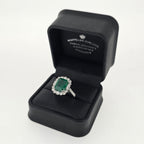 3.86ct Emerald and Diamond Cluster Ring with Diamond Shoulders Set in Platinum