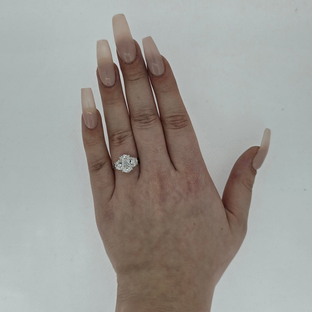 IGI 3.03ct D/VS2 Oval Shape LAB Diamond Ring with Half Moon Side Stones Set in Platinum - Montpellier Jewellers