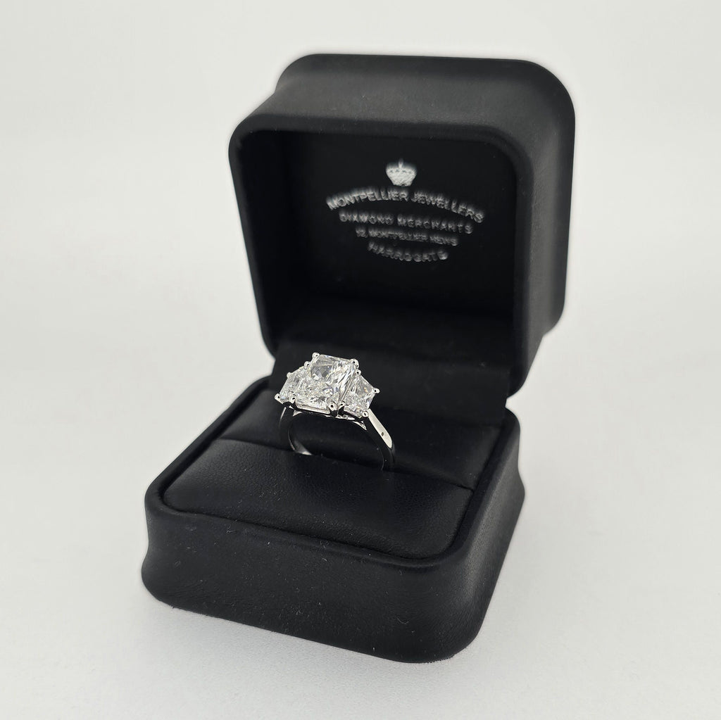 IGI 3.07ct D/VS1 Radiant Cut LAB Diamond Solitaire Ring with Trapezoid Side Stones Set in Platinum - Montpellier Jewellers