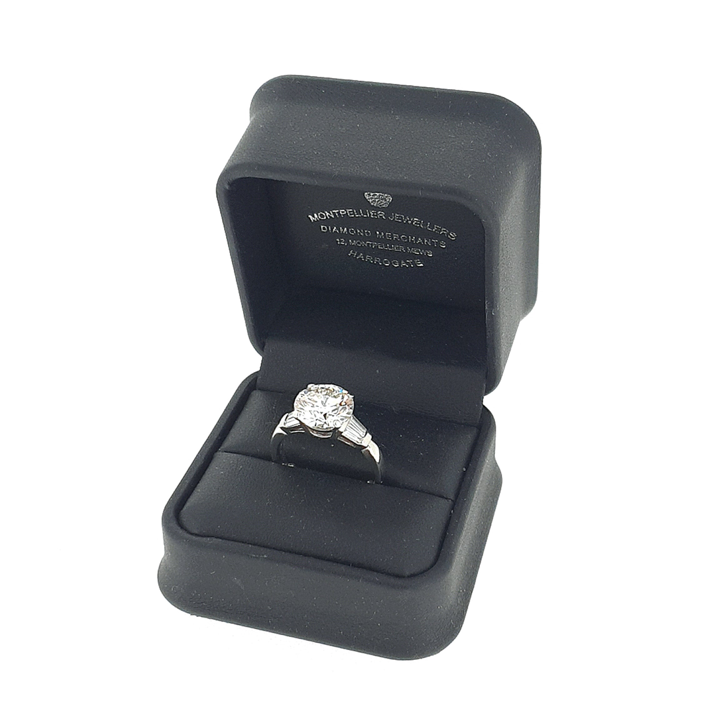GIA 4.51ct J/SI1 Round Brilliant Cut Diamond Solitaire Ring with Tapered Baguette Shoulders Set in 18ct White Gold
