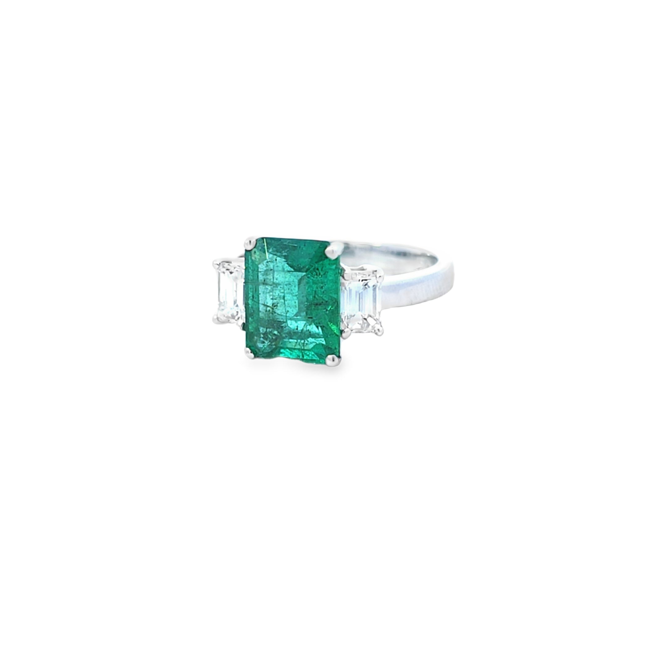 VIP Emerald Ring with Emerald Cut Diamond Side Stones Set in 18ct White Gold - Montpellier Jewellers