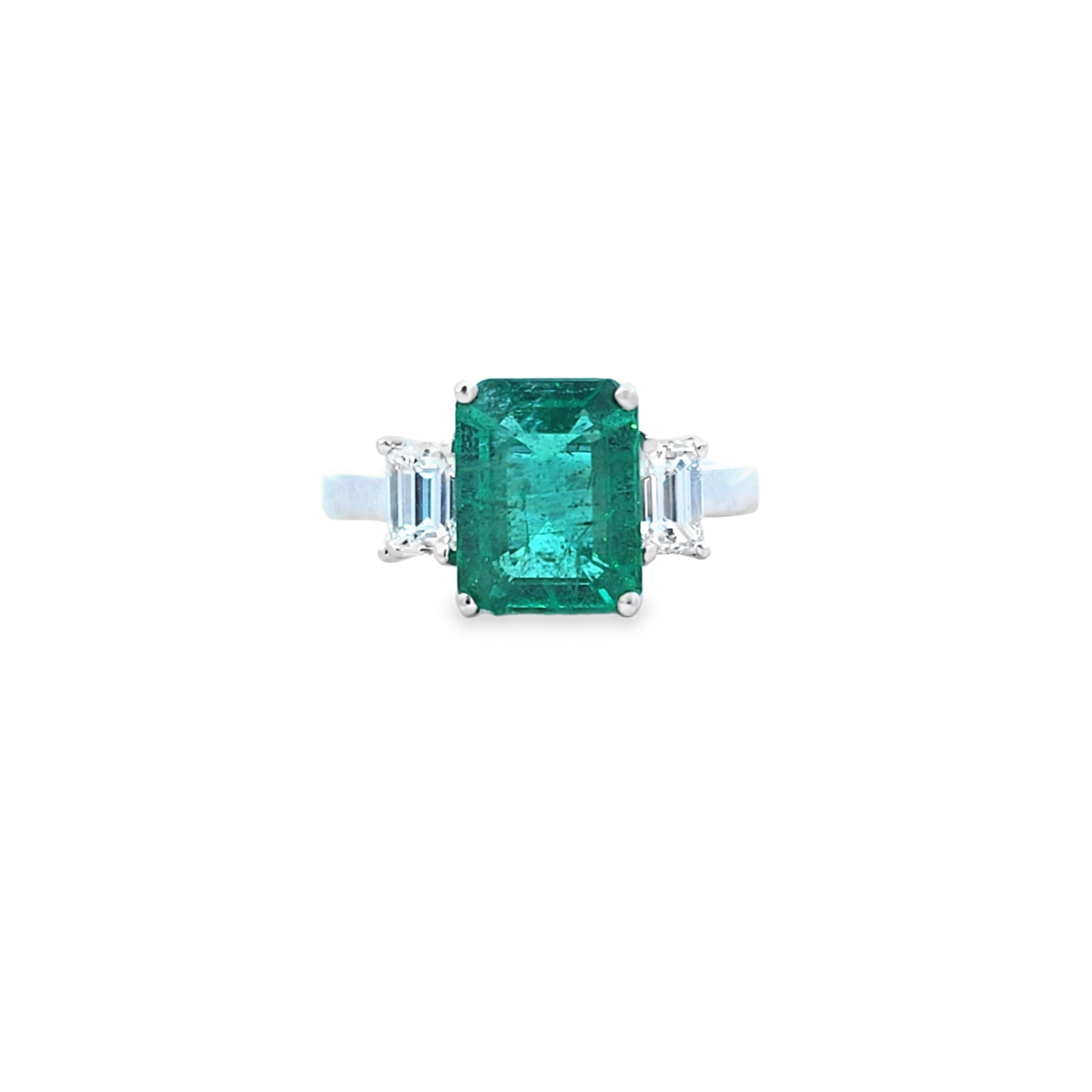VIP Emerald Ring with Emerald Cut Diamond Side Stones Set in 18ct White Gold - Montpellier Jewellers