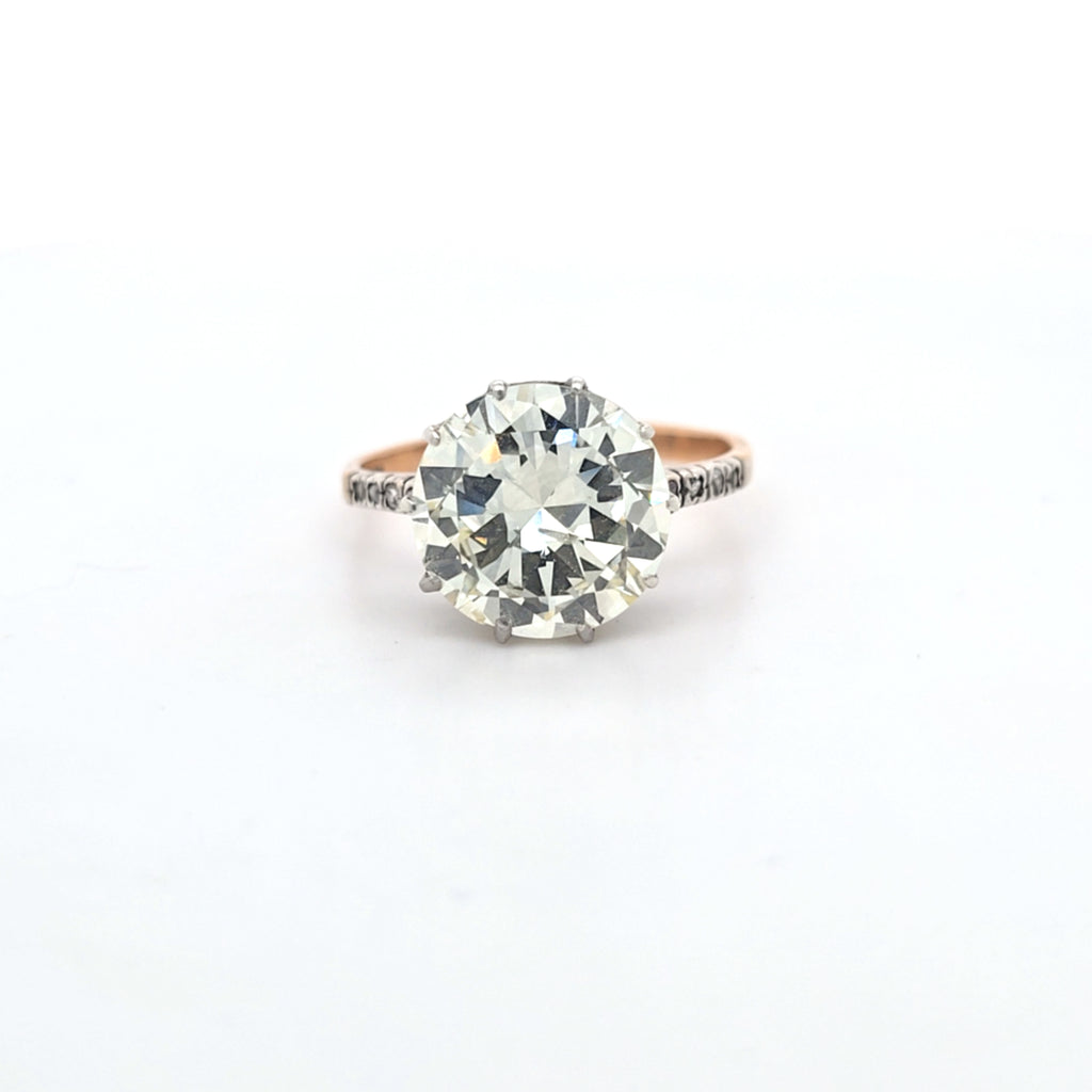5.23ct M/SI Round Brilliant Cut Diamond Solitaire set in 18ct Gold with Diamond Shoulders