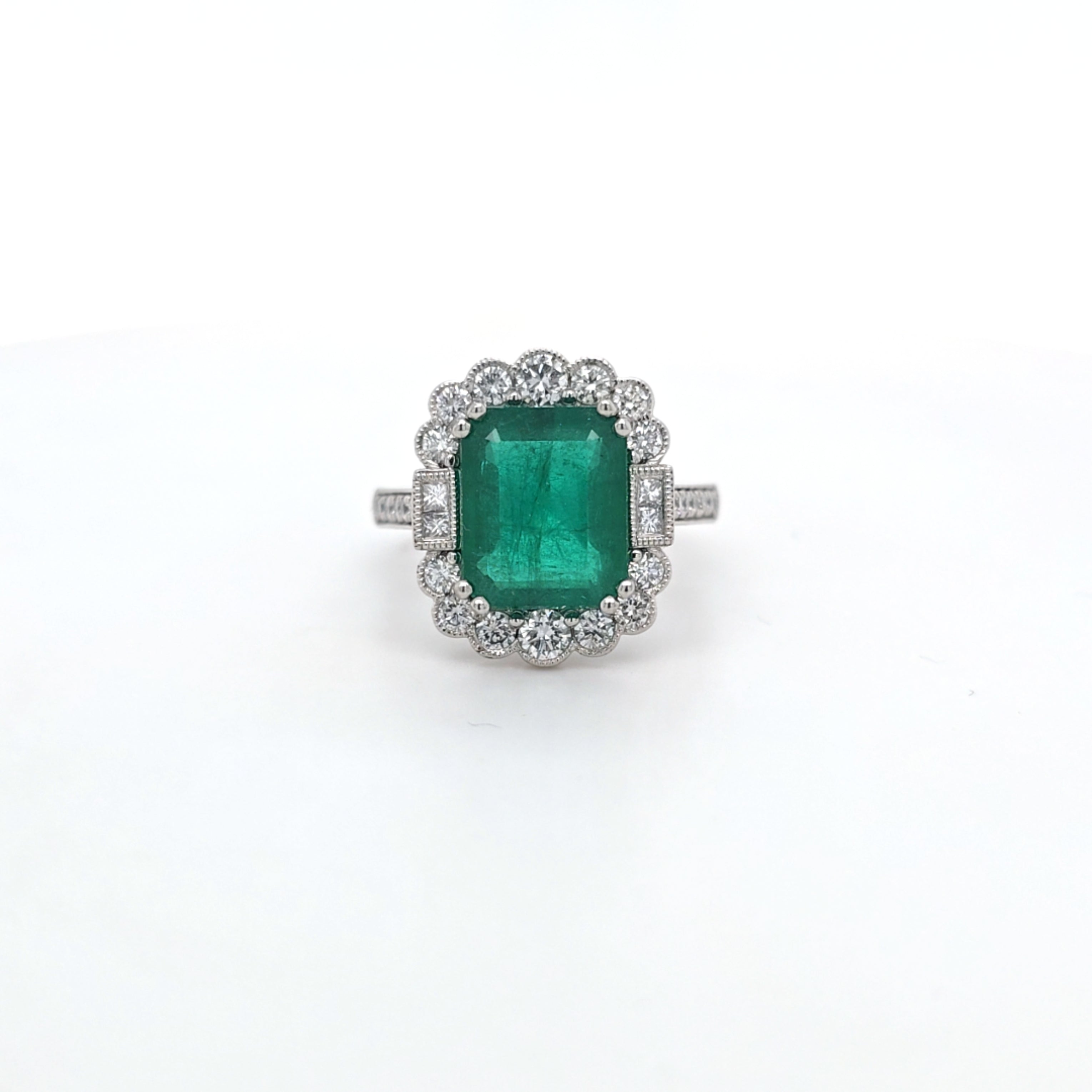 3.86ct Emerald and Diamond Cluster Ring with Diamond Shoulders Set in Platinum - Montpellier Jewellers