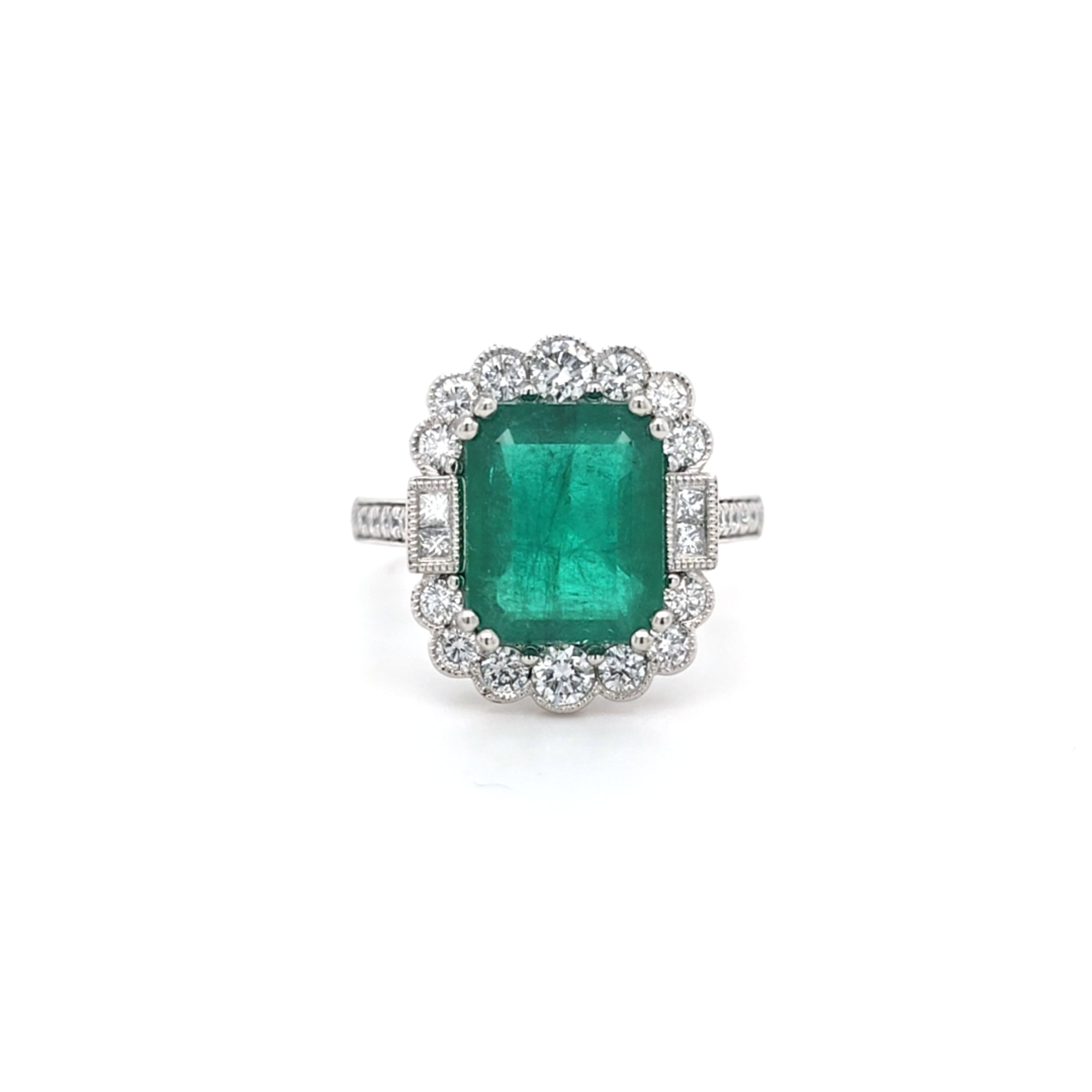 3.86ct Emerald and Diamond Cluster Ring with Diamond Shoulders Set in Platinum - Montpellier Jewellers