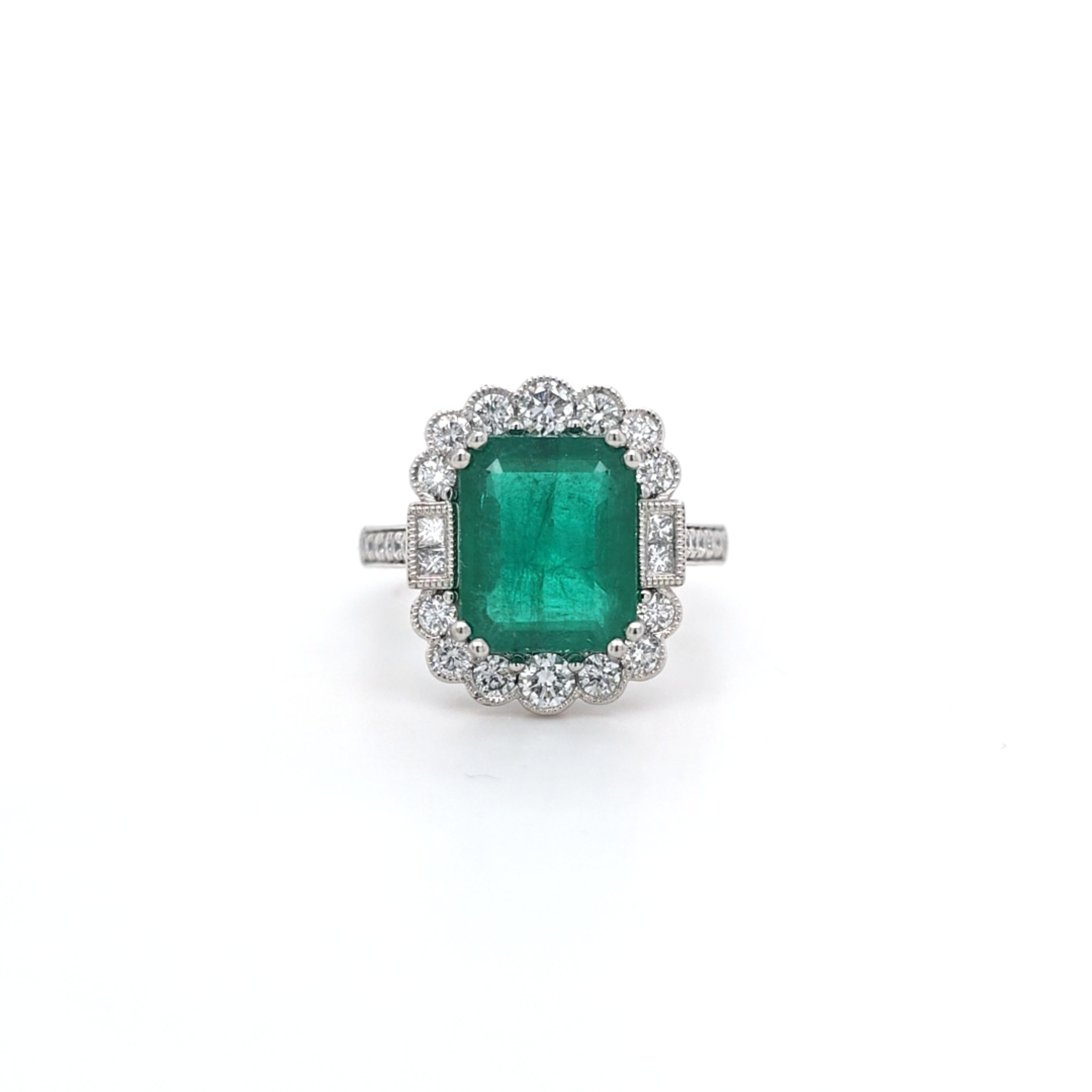 3.86ct Emerald and Diamond Cluster Ring with Diamond Shoulders Set in Platinum - Montpellier Jewellers