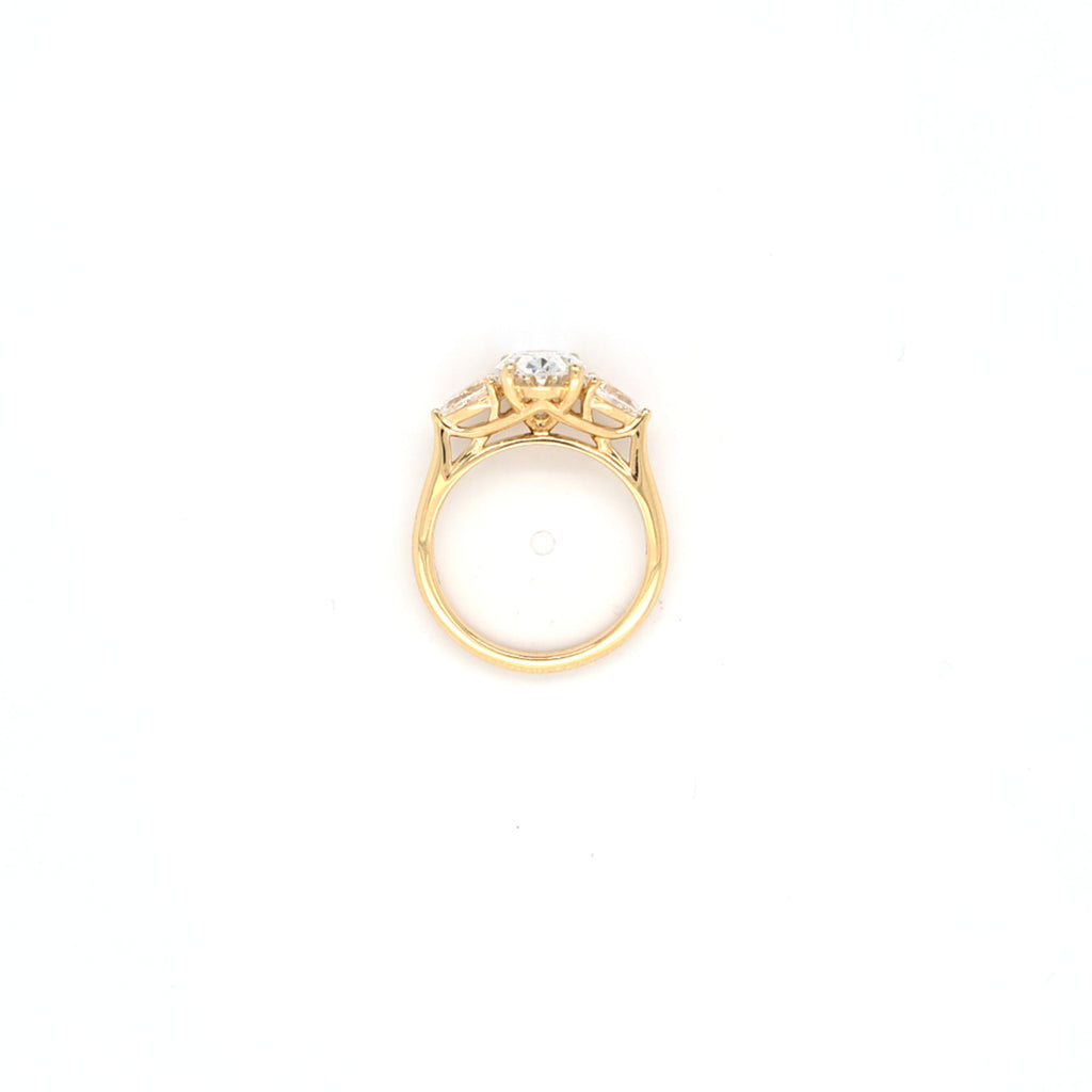 2.02ct D/VS2 Oval Cut LAB Diamond Ring with Pear Shape Side Stones Set in 18ct Yellow Gold
