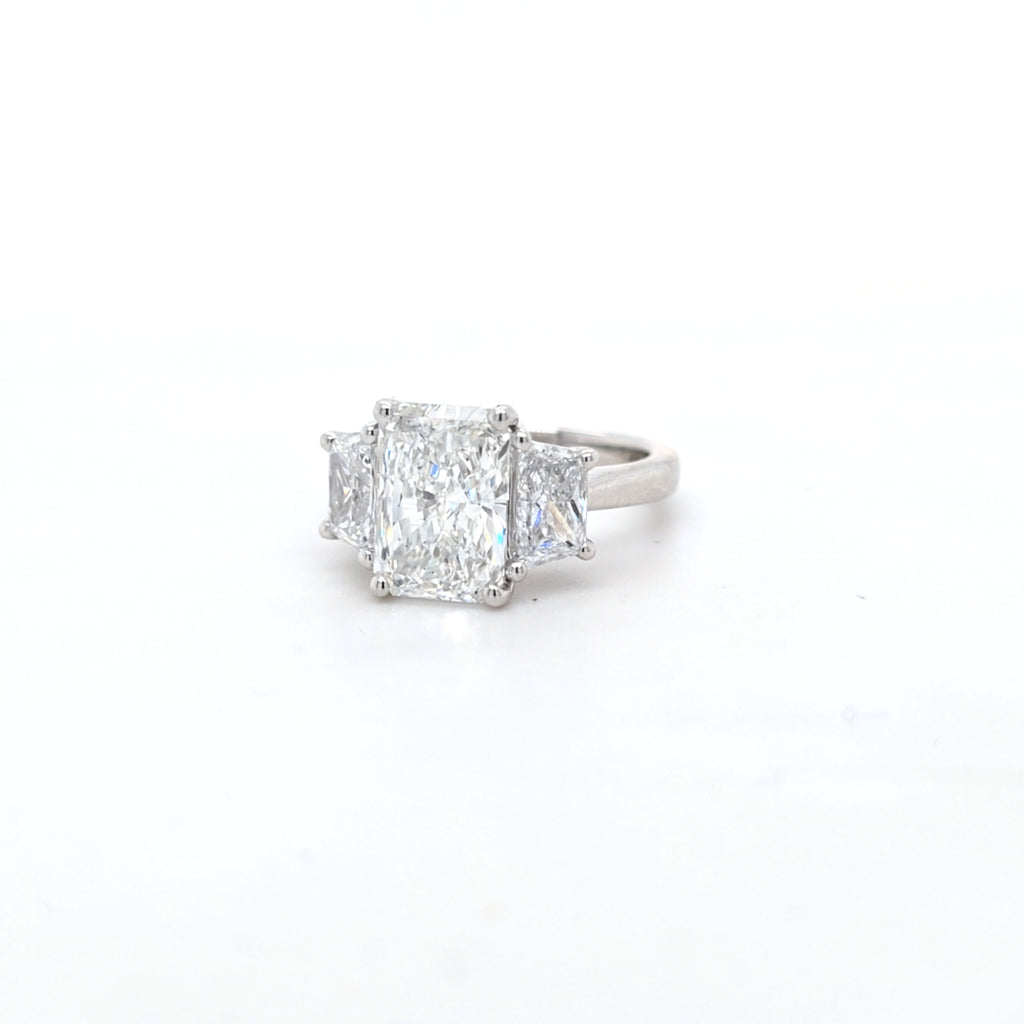 IGI 3.07ct D/VS1 Radiant Cut LAB Diamond Solitaire Ring with Trapezoid Side Stones Set in Platinum - Montpellier Jewellers
