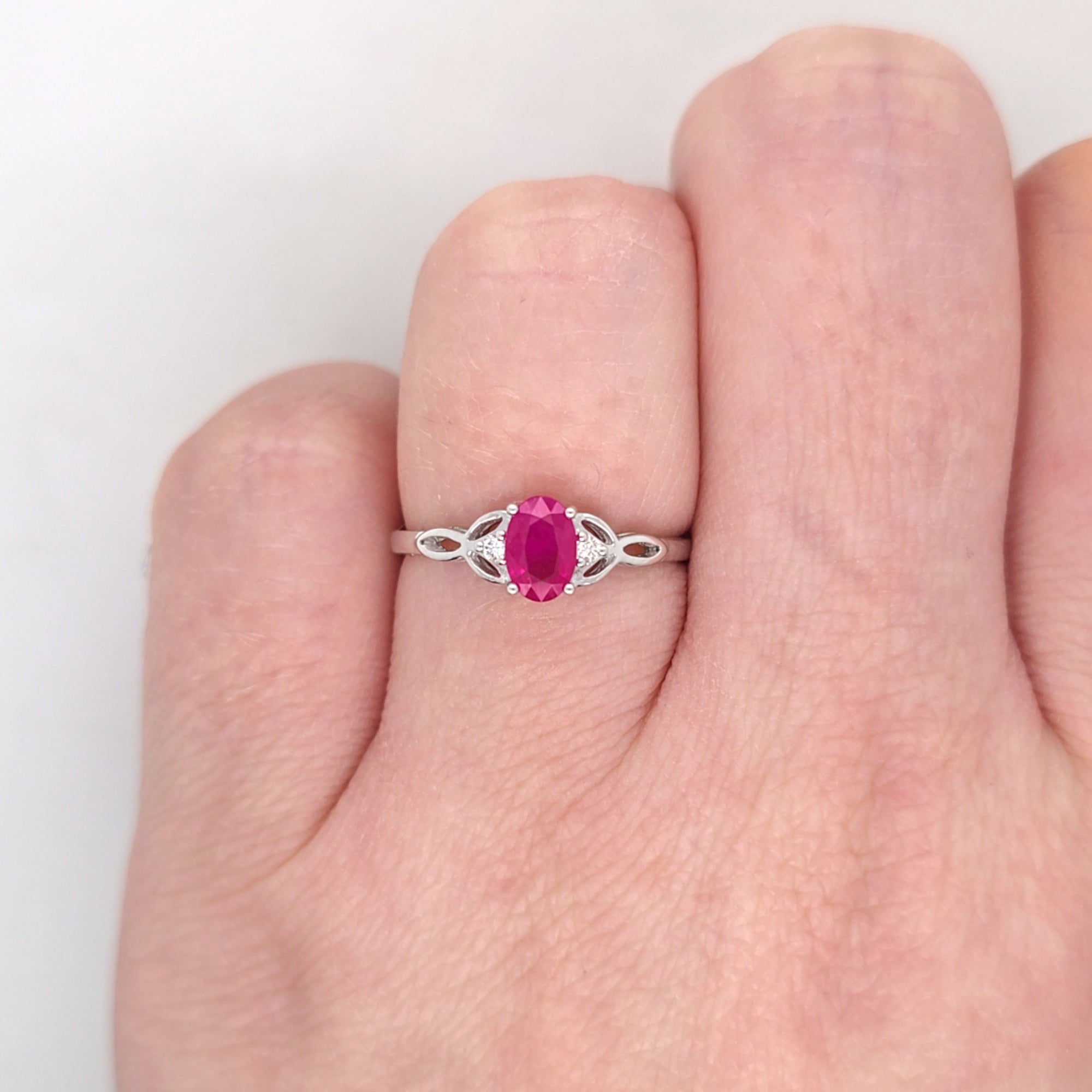 0.65ct Oval Cut Ruby & Diamond Fancy Ring Set in White Gold - Montpellier Jewellers