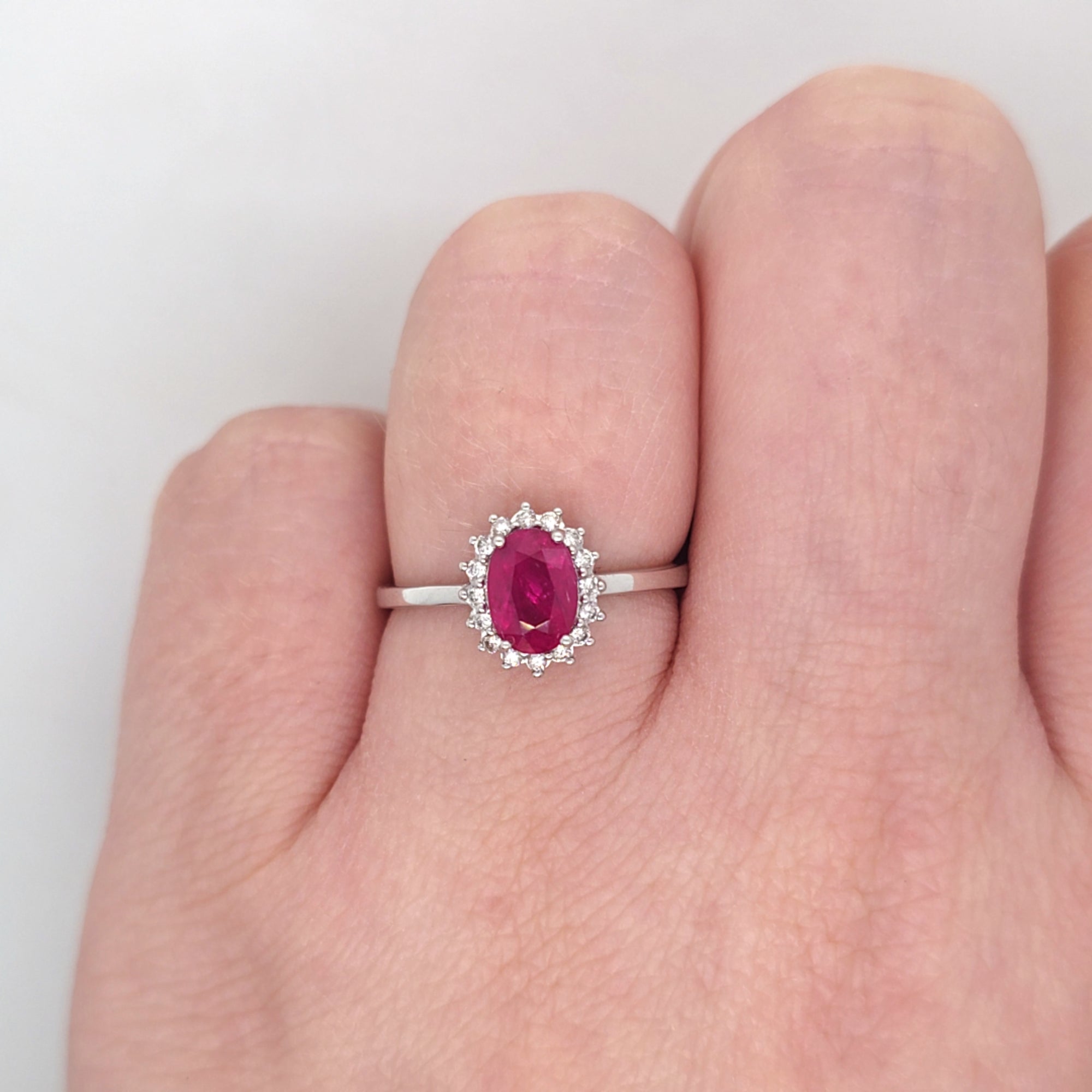0.96ct Oval Cut Ruby & Diamond Cluster Ring Set in White Gold - Montpellier Jewellers