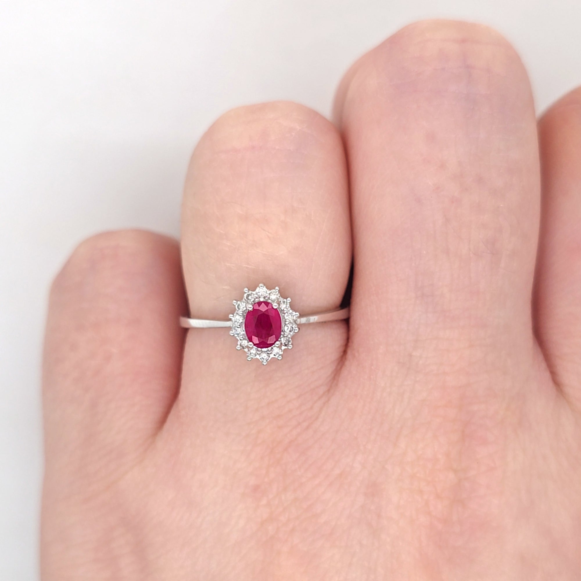 0.50ct Oval Cut Ruby & Diamond Cluster Ring Set in White Gold - Montpellier Jewellers