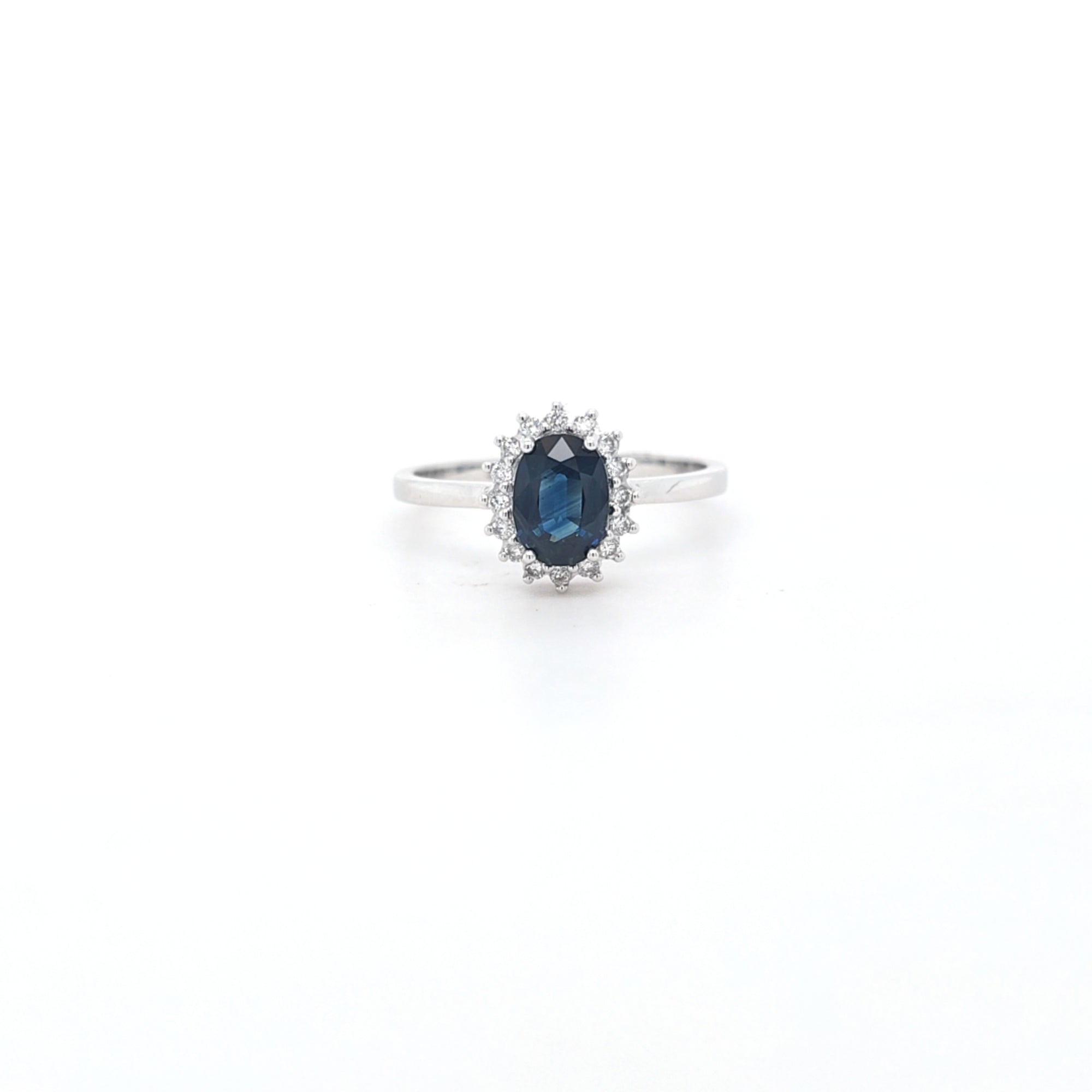 0.96ct Oval Cut Sapphire & Diamond Cluster Ring Set in White Gold - Montpellier Jewellers