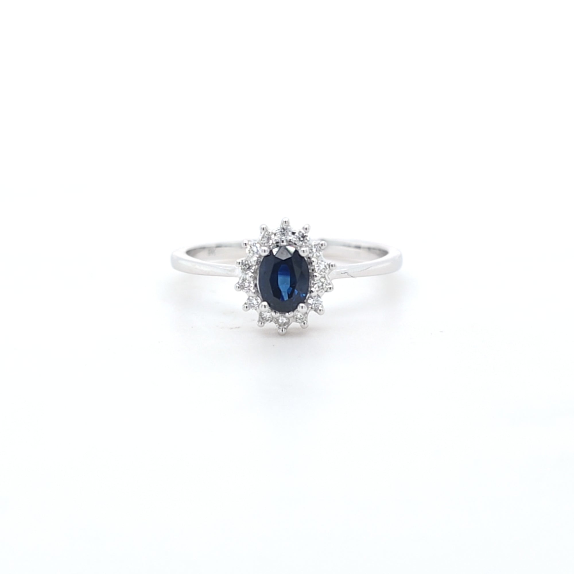 0.50ct Oval Cut Sapphire & Diamond Cluster Ring Set in White Gold - Montpellier Jewellers