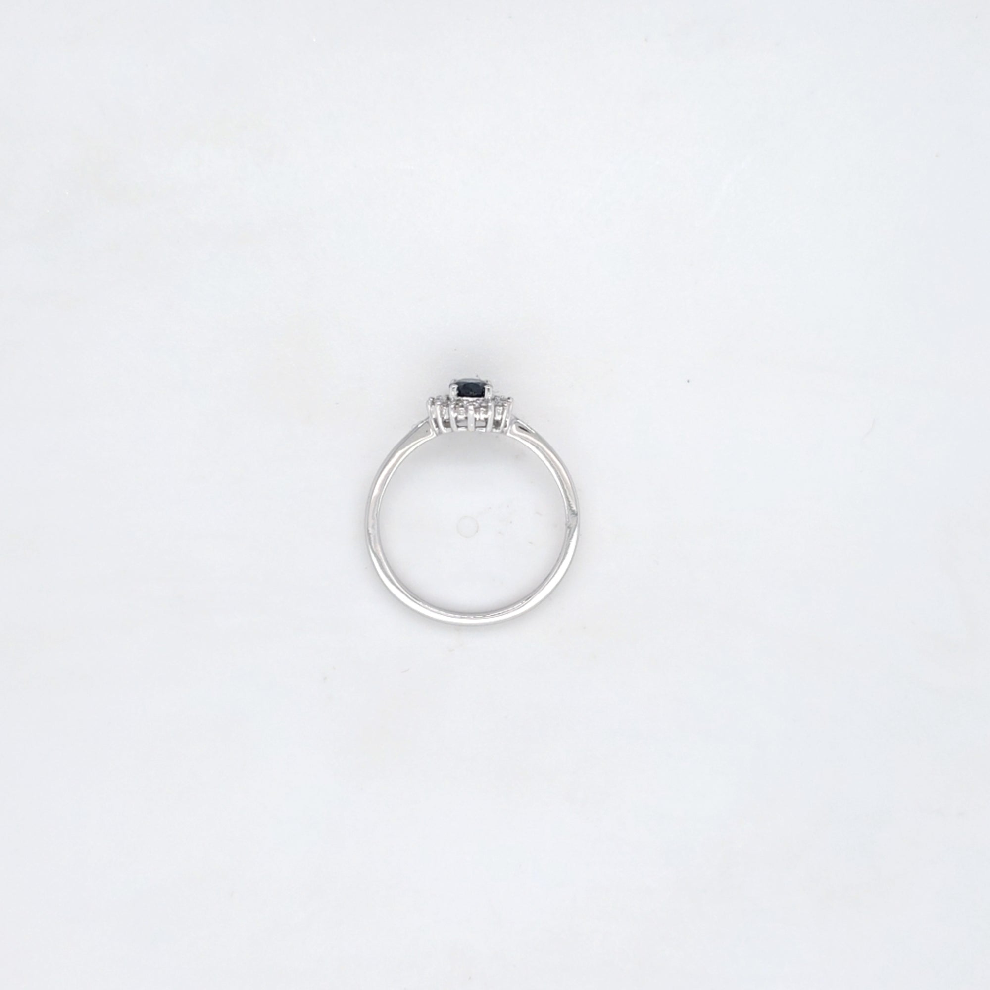 0.50ct Oval Cut Sapphire & Diamond Cluster Ring Set in White Gold - Montpellier Jewellers