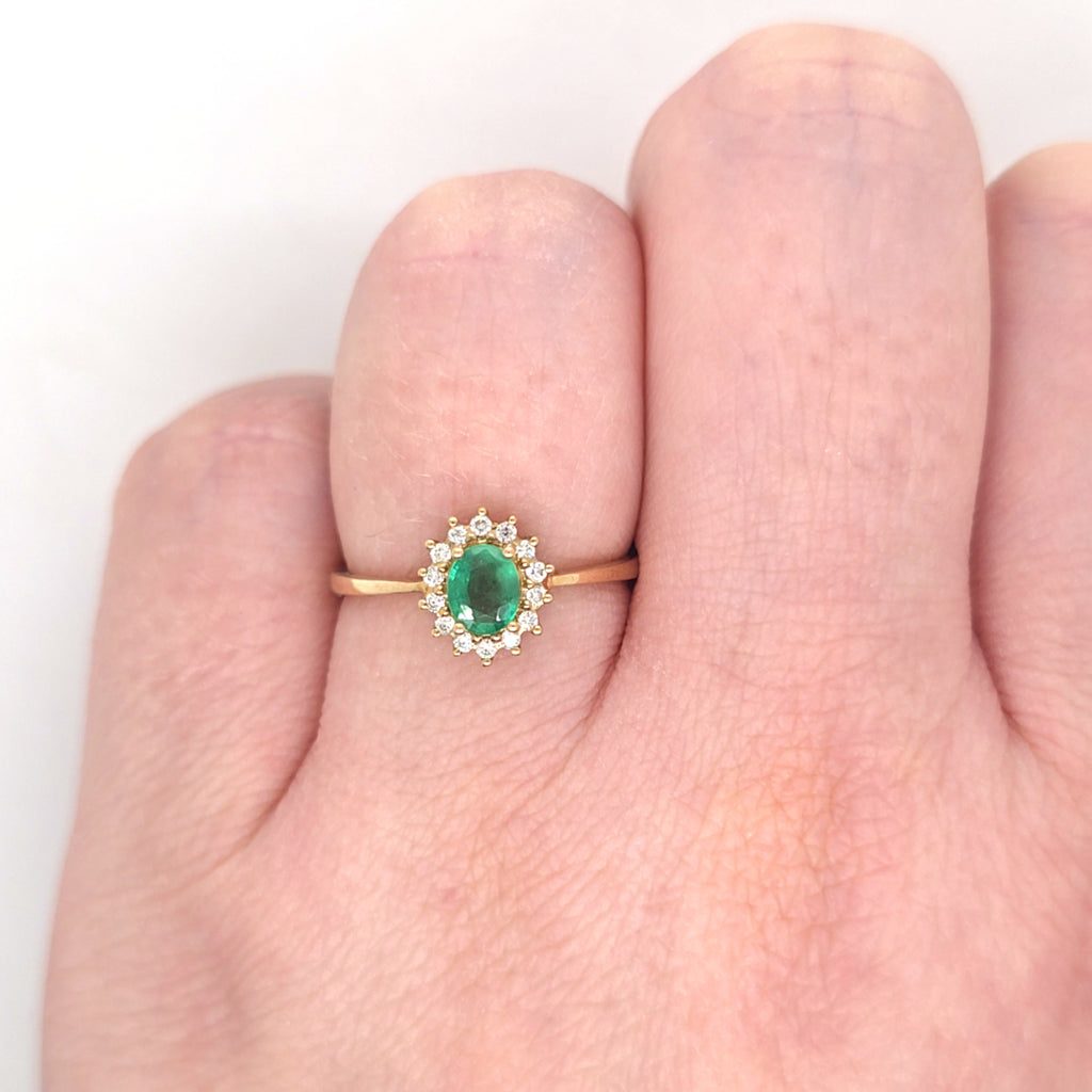 0.37ct Oval Cut Emerald & Diamond Cluster Ring Set in Yellow Gold - Montpellier Jewellers