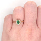 0.37ct Oval Cut Emerald & Diamond Cluster Ring Set in Yellow Gold - Montpellier Jewellers