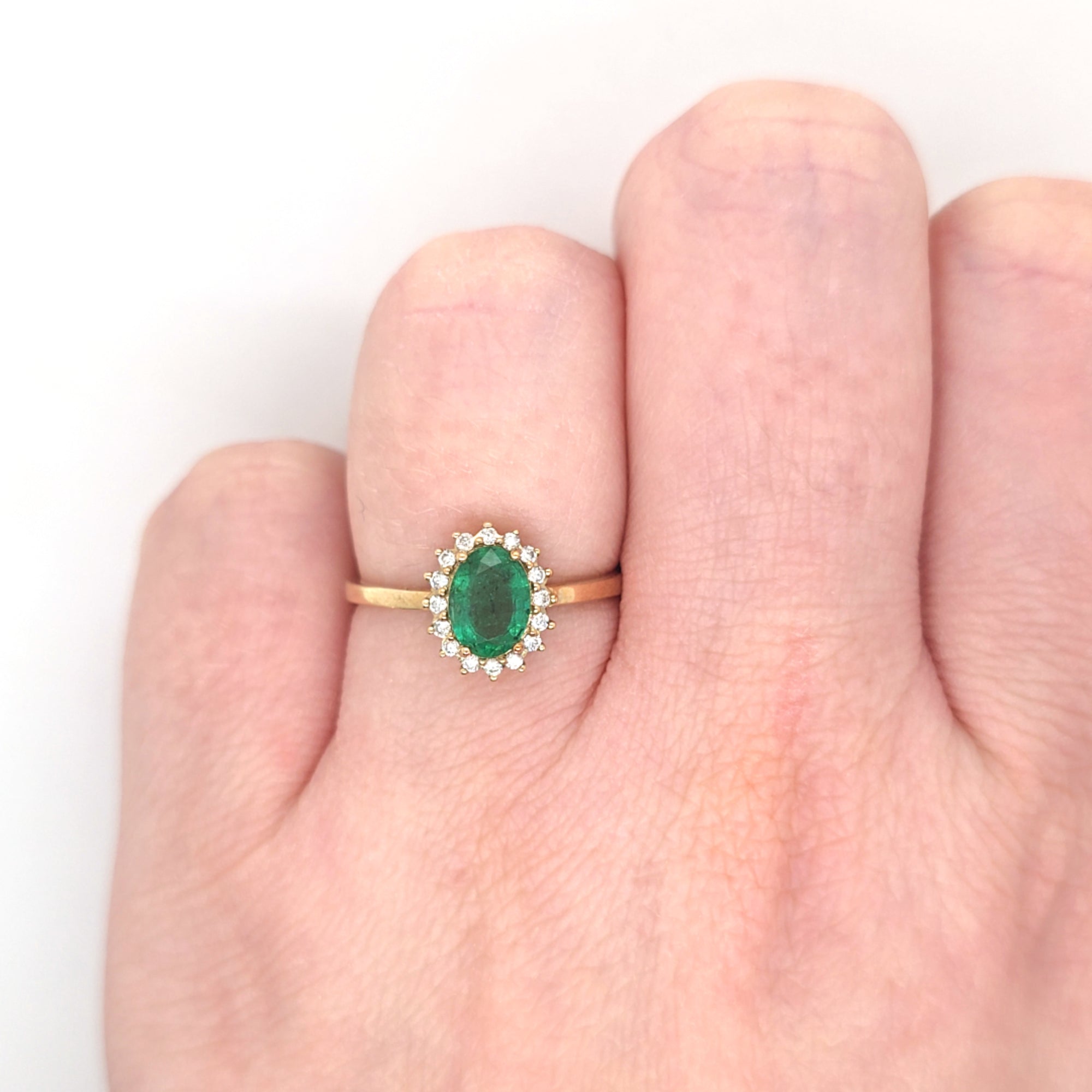 0.96ct Oval Cut Emerald & Diamond Cluster Ring Set in Yellow Gold - Montpellier Jewellers