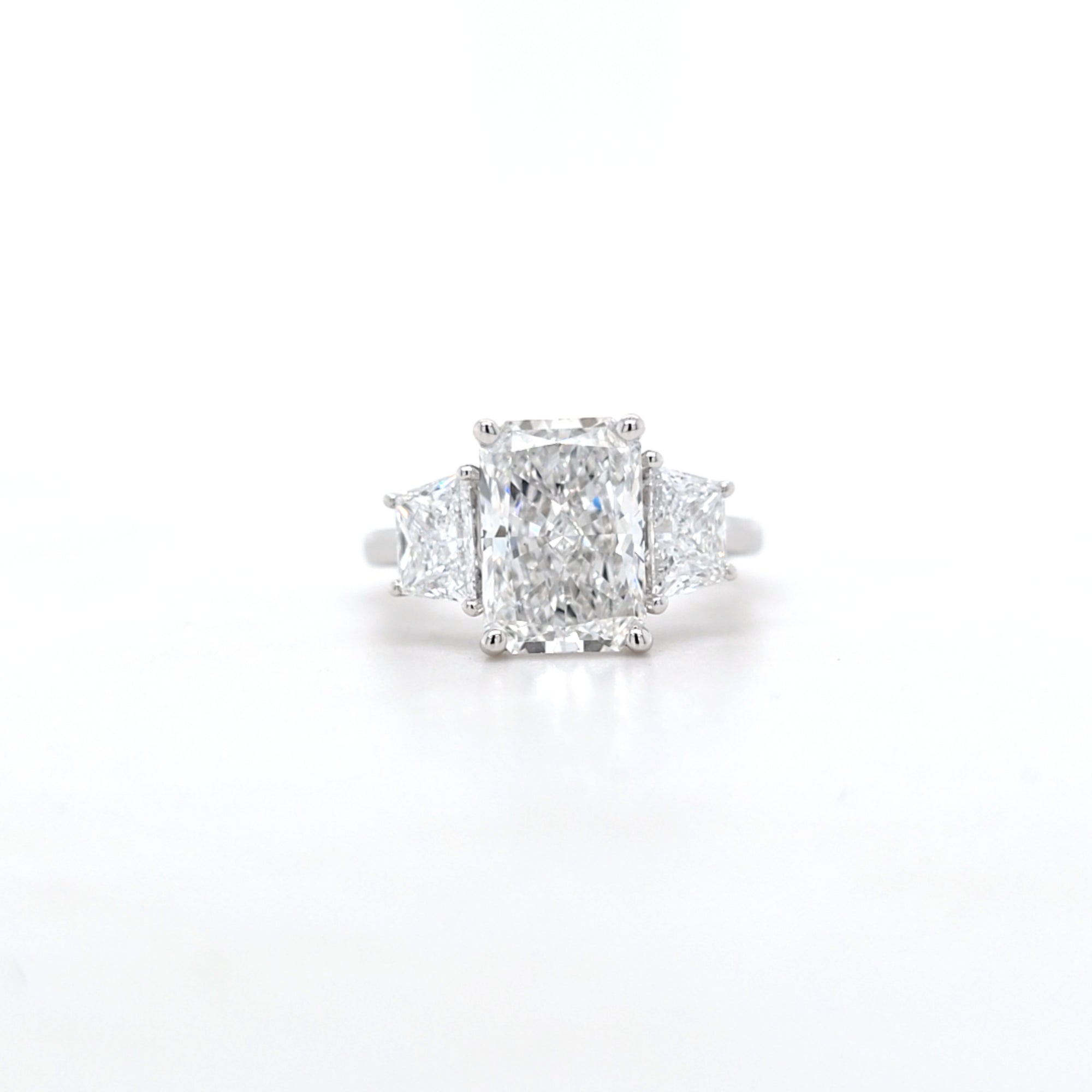 IGI 3.00ct D/VS2 Radiant Cut LAB Diamond Ring with Trapezoid Side Stones Set in Platinum - Montpellier Jewellers