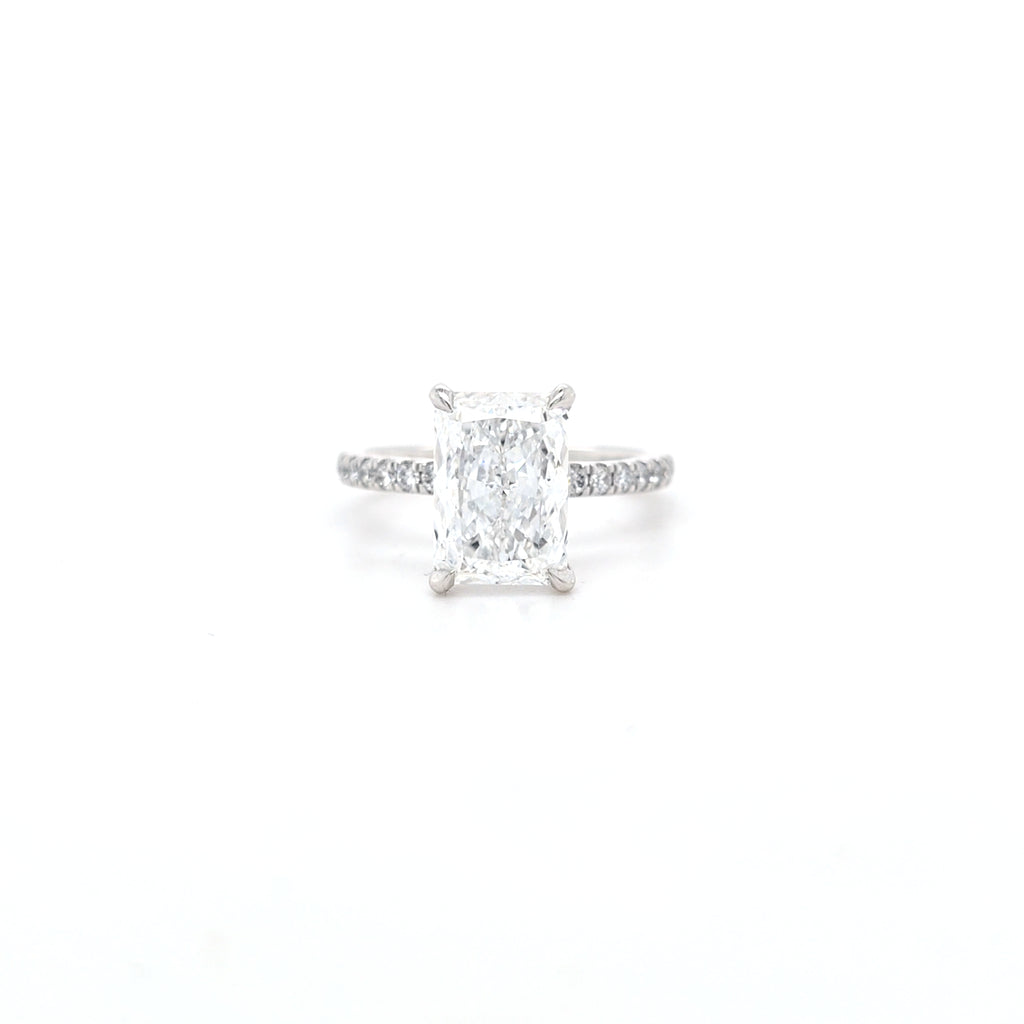 IGI 3.01ct D/VS2 Radiant Cut LAB Diamond Solitaire set in Platinum with Diamond Shoulders & Ruby Accent Stone - Montpellier Jewellers