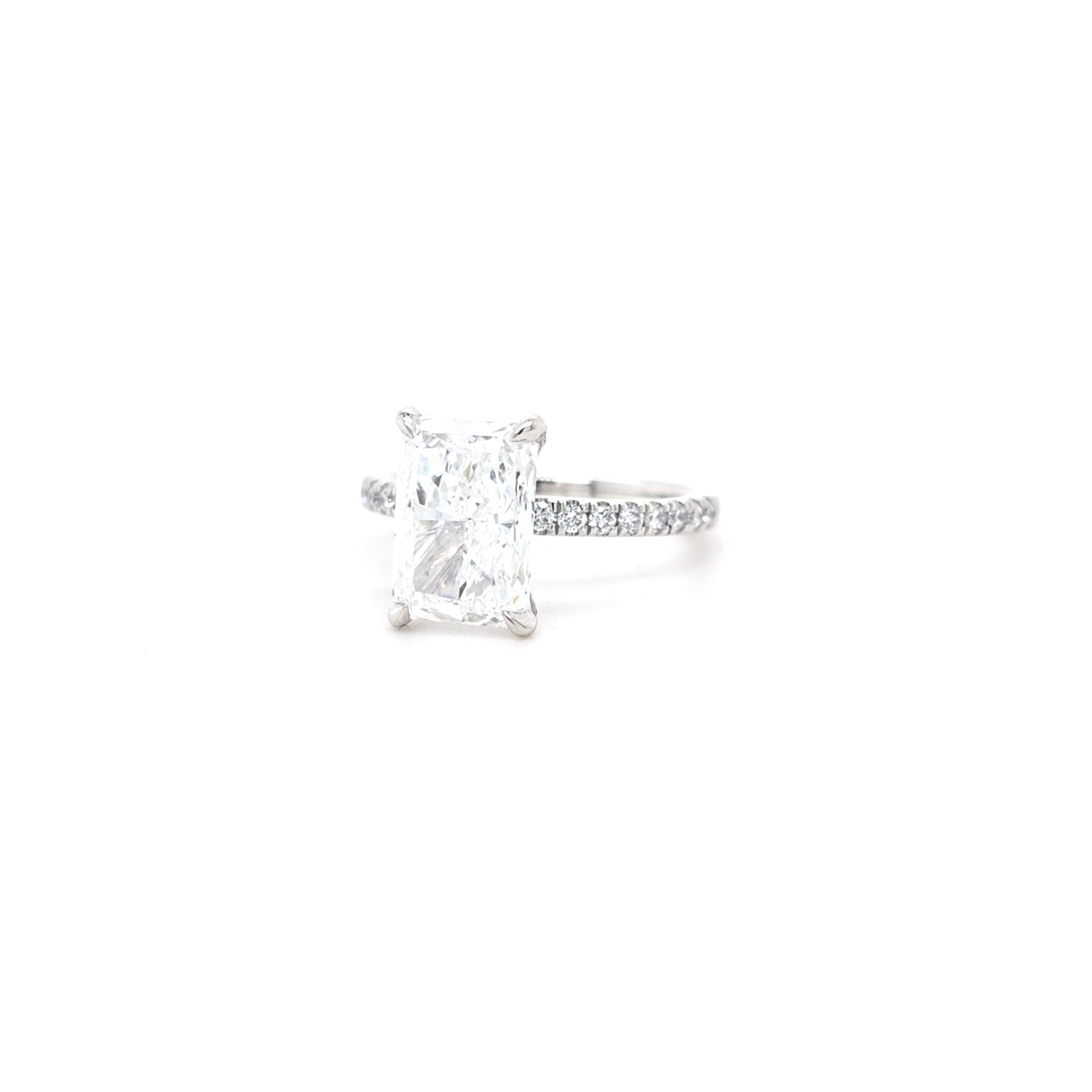 IGI 3.01ct D/VS2 Radiant Cut LAB Diamond Solitaire set in Platinum with Diamond Shoulders & Ruby Accent Stone - Montpellier Jewellers