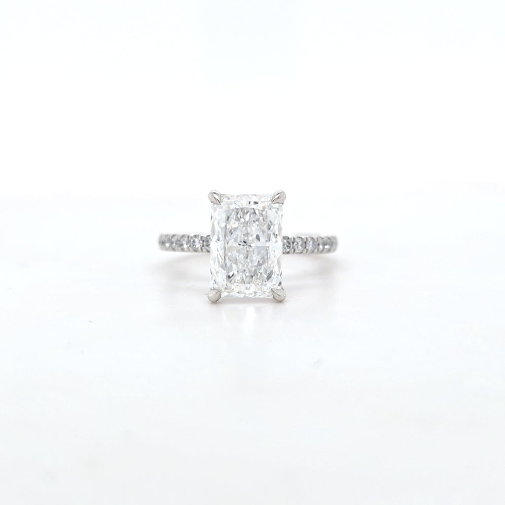 IGI 3.01ct D/VS2 Radiant Cut LAB Diamond Solitaire set in Platinum with Diamond Shoulders & Ruby Accent Stone - Montpellier Jewellers