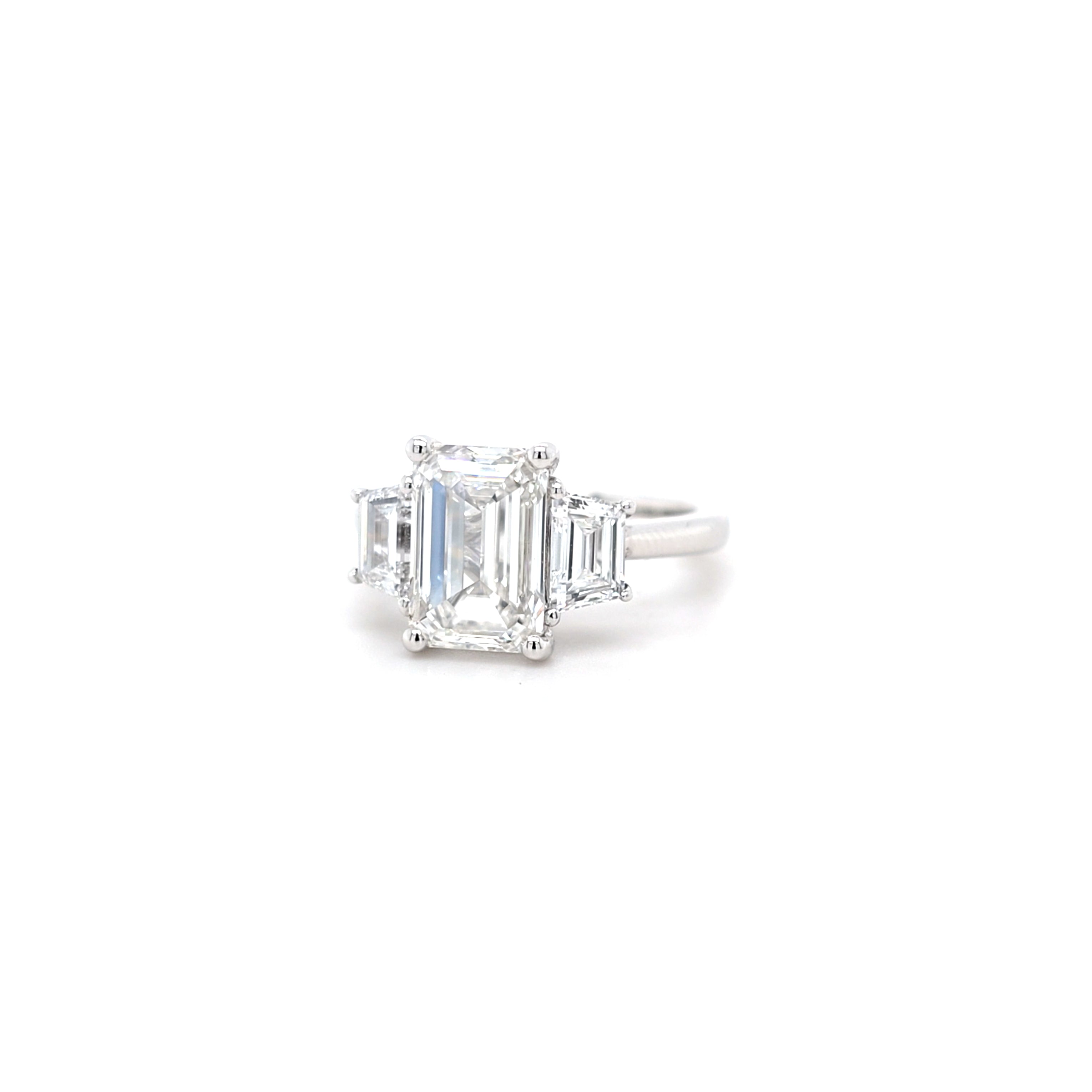 IGI 3.01ct D/VS1 Emerald Cut LAB Diamond Ring with Trapezoid Side Stones Set in Platinum - Montpellier Jewellers