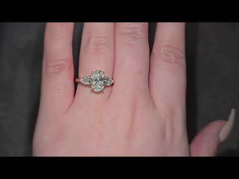 2.02ct D/VS2 Oval Cut LAB Diamond Ring with Pear Shape Side Stones Set in 18ct Yellow Gold