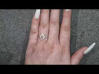 GIA 0.29ct Fancy Purplish Pink Pear Cut Diamond Halo Ring Set in 18ct White Gold